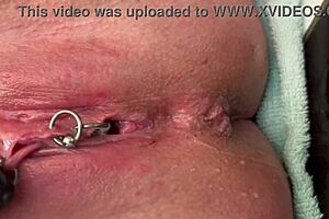 Pierced clit hard rubbing in latex gloves ends with hard stream pee solo