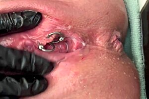 Pierced clit hard rubbing in latex gloves ends with hard stream pee solo