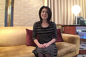 Japan mom granny Nobuko Tachikawa shows off pink pussy with hairy creampie lips in stockings and anal finger play on bed