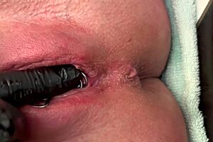 Pierced clit hard rubbing in latex gloves ends with hard stream pee solo