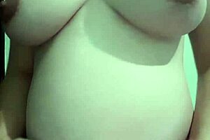 why is this pregnant milf getting cream and massage on her natural tits