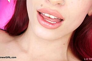 red haired model strips down on sofa during casting interview showing petite body