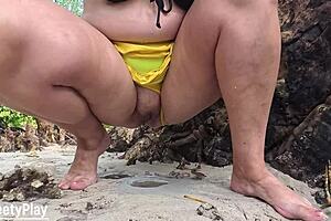 I can't believe how this mature BBW pees her dripping hairy pussy in the sand outdoors with bare feet and juicy curves.