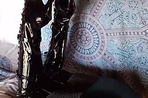 Petite brunette milf in sexy total black outfit with fishnets pantyhose and over-the-knee boots