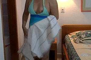 stepmom at the beach puts on a bikini shows off masturbates and urinates