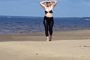 big leather ass blonde milf walks on beach in heels showing natural tits and pussy
