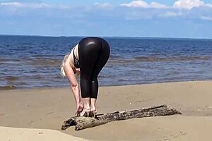 big leather ass blonde milf walks on beach in heels showing natural tits and pussy