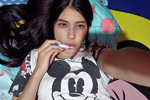 an 18-year-old college girl explores her toy in a private homemade session