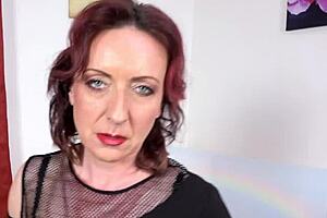 Oh man, this mature milf is really going wild on her wet lubed pussy slit solo