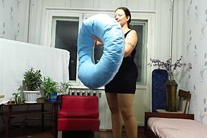 Milf engages in looner fetish by inflating beach circle