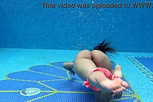 Hey, how does Hungarian naked Sazan Cheharda tease while swimming underwater?