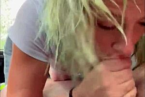 Streetwalker in wet t-shirt gives backseat blowjob and keeps sucking after cum in mouth