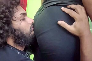Indian couple shares sweet kisses and romantic moments with chubby wife riding big cock in bedroom.