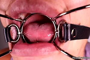 She explored her mouth fetish up close while gagged in that intense session