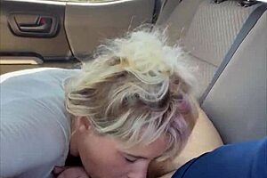 Pretty hooker kneels down for a man to release in her mouth after a deepthroat blowjob on the street.