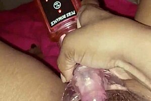 Woman explores her body with toys in a Caribbean setting