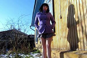 Watch this milf piss standing behind garages in open air! Her dirty pussy loves urinating in public places for amateur fetish!