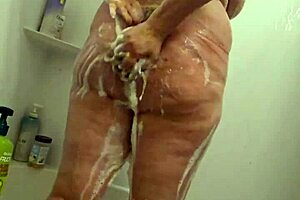 Did you see this hidden cam catching voyeur BBW milf soaking wet in shower?