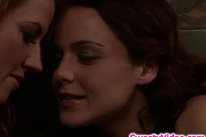 Lesbian babysitter starts fingering her milf boss during a steamy encounter.