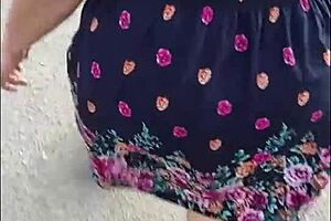 casual upskirt view of puta callejera in skirt on street