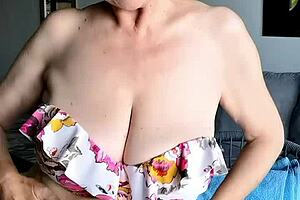 What happens when busty mature milf in bikini strips to tease with dildo for strong orgasm?