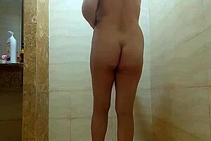 oh man, watching nude regina noir in shower washing and rubbing oil... so hot