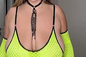 Stepmom shakes huge natural tits on bed touching wet self