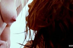 tanned milf with saggy natural tits and bushy vagina casually lures pale blonde teen under shower for intense lesbian licking and kissing