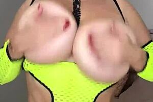 Stepmom shakes huge natural tits on bed touching wet self