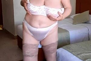 hot gilf with big tits and natural boobs enjoys bbc action while playing with her huge dildo in stockings