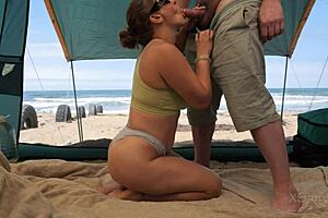 risky sex with a stranger on the beach, this pretty babe flashing her big natural tits and getting a facial outdoors.