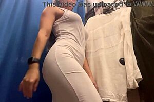 damn, check out this milf with massive boobs slipping into sexy dresses on hidden cam!