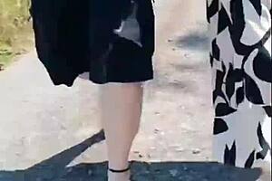 Hot granny's sunny walk