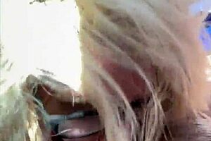 hey, check out this real hooker with glasses dropping to her knees in public, sucking off an old man for cash and taking his cum load in her mouth