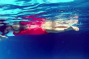 canadian milf heidi posing with big tits and ass in pool