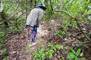 Thai teen gets lost in forest, ends up horny and fucking wildly. She's the cute girl next door type, riding in nature passionately.
