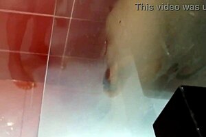 under the shower this latina milf with huge natural tits and big nipples bathed sensually in homemade video