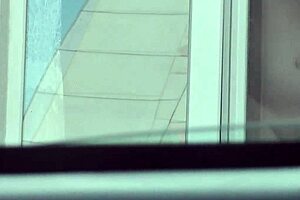 Nude neighbor mature milf without panties or bra washes windows while taxi driver watches from car 😏