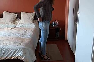 very hot stepmom tries on jeans without panties before heading to work. she looks confident and ready for the day