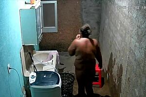 Hidden Camera Catches Busty Brazilian Neighbor Masturbating in Backyard While Voyeur Watches Intensely