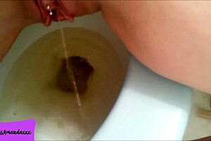 My shaved pierced pussy is peeing in the bathroom compilation for you.