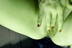 She transforms into She Hulk for homemade Halloween fun. Big green woman shows off green ass green feet and green pussy.