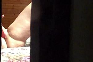 peeping tom spies hot amateur milf masturbating wildly in hotel room...