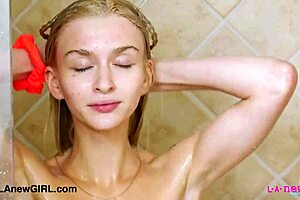 Cute 18+ blonde teen steps into the shower for you...