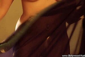 Exotic Brunette Follows Sensual Urges In Erotic Solo Dance