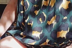 mature blonde cougar flashes her huge shaved cameltoe pussy outdoors 😏👅