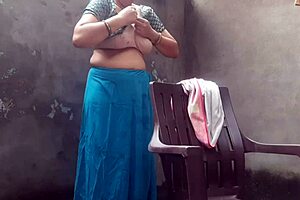 hey wife chilling with a bath right in the outdoor yard spot