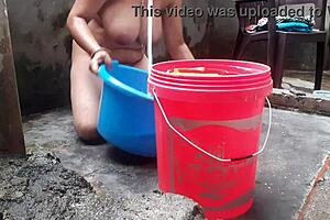 hey wife chilling with a bath right in the outdoor yard spot