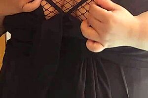 Latina milf wife flaunts huge natural tetona tits in fishnets