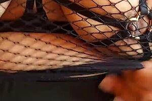 Latina milf wife flaunts huge natural tetona tits in fishnets